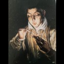 ragazzo che soffia sul tizzone ardente