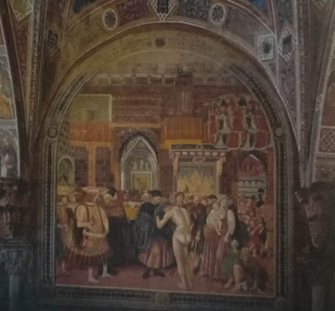Storia dell’ospedale Santa Maria della Scala - l’elargizione di elemosina, indumenti e cibo. Domenico Di Bartolo 1441-44