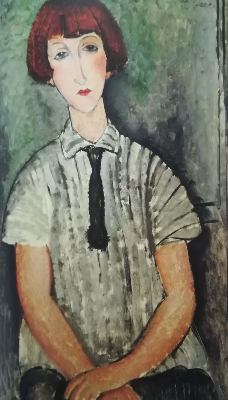 Giovane donna con camicetta rigata - Amedeo Modigliani 1917
