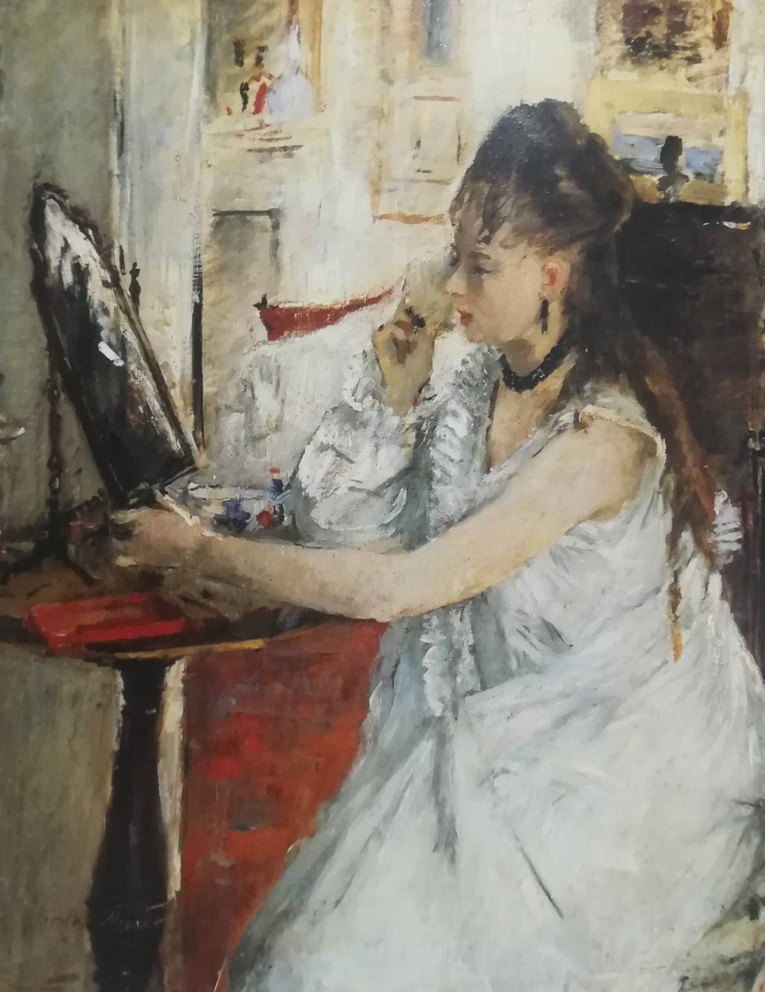 Giovane donna che si incipria - Berthe Morisot, 1877