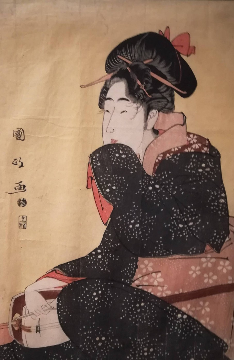 Geisha che ride con shamisen in grembo - Utagawa Kuninasa