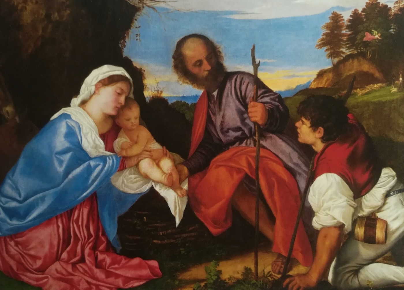La sacra famiglia con un pastore