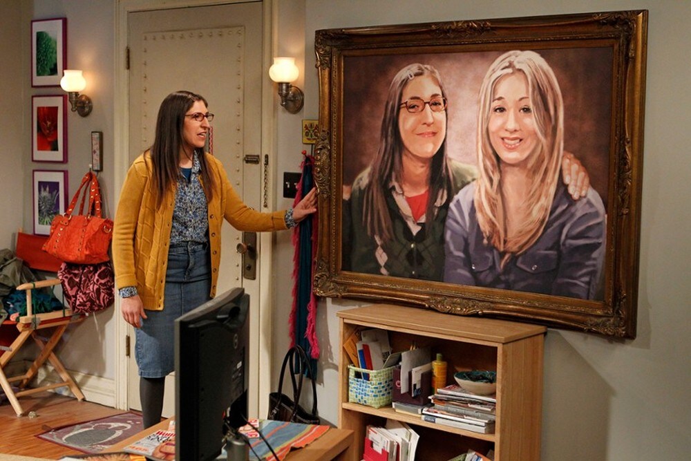 Amy regala fiera, il quadro con lei e Penny dipinte