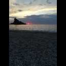 tramonto osservato dalla spiaggia di Palmi