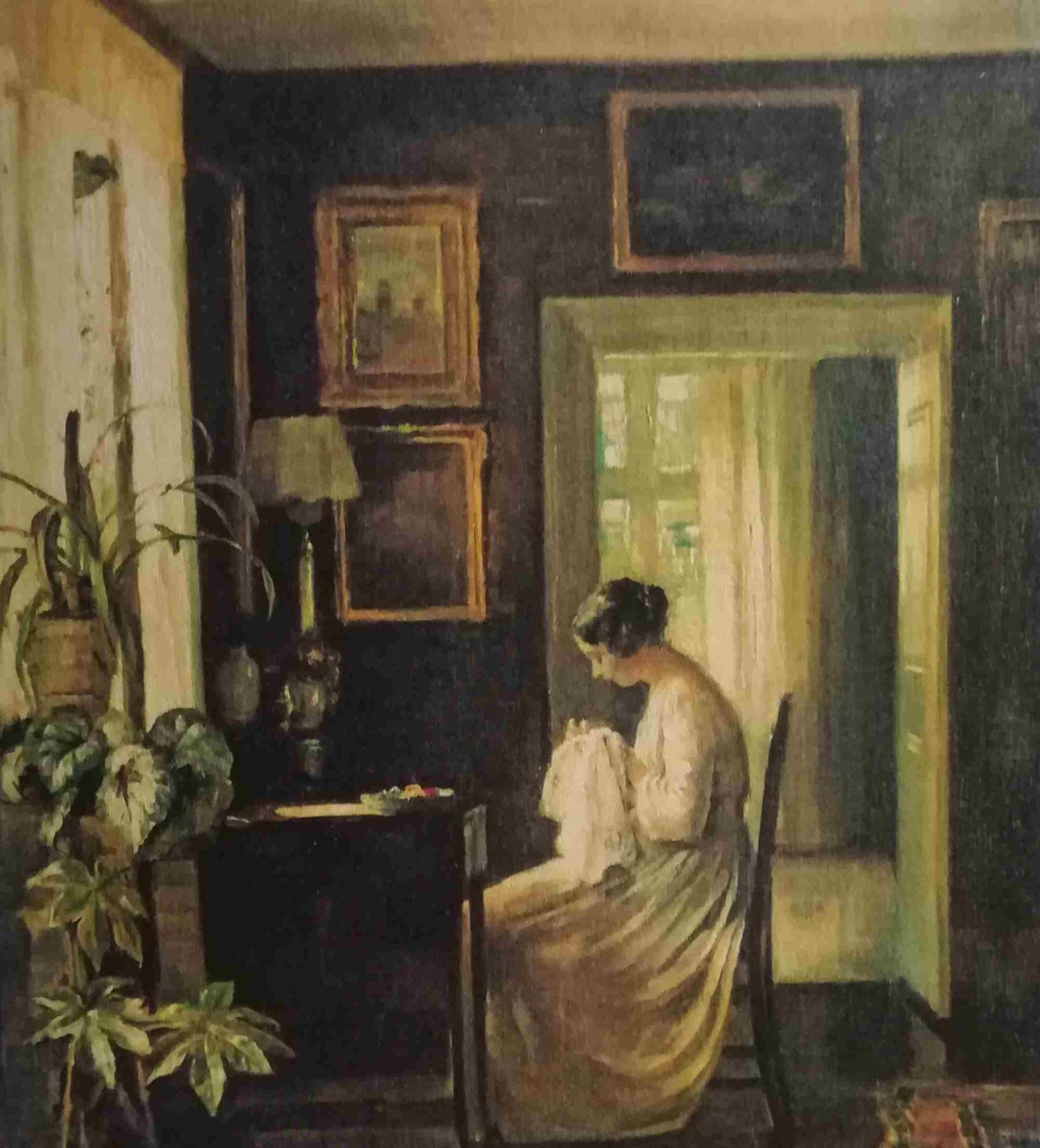 Carl Holsoe, interno con donna che ricama