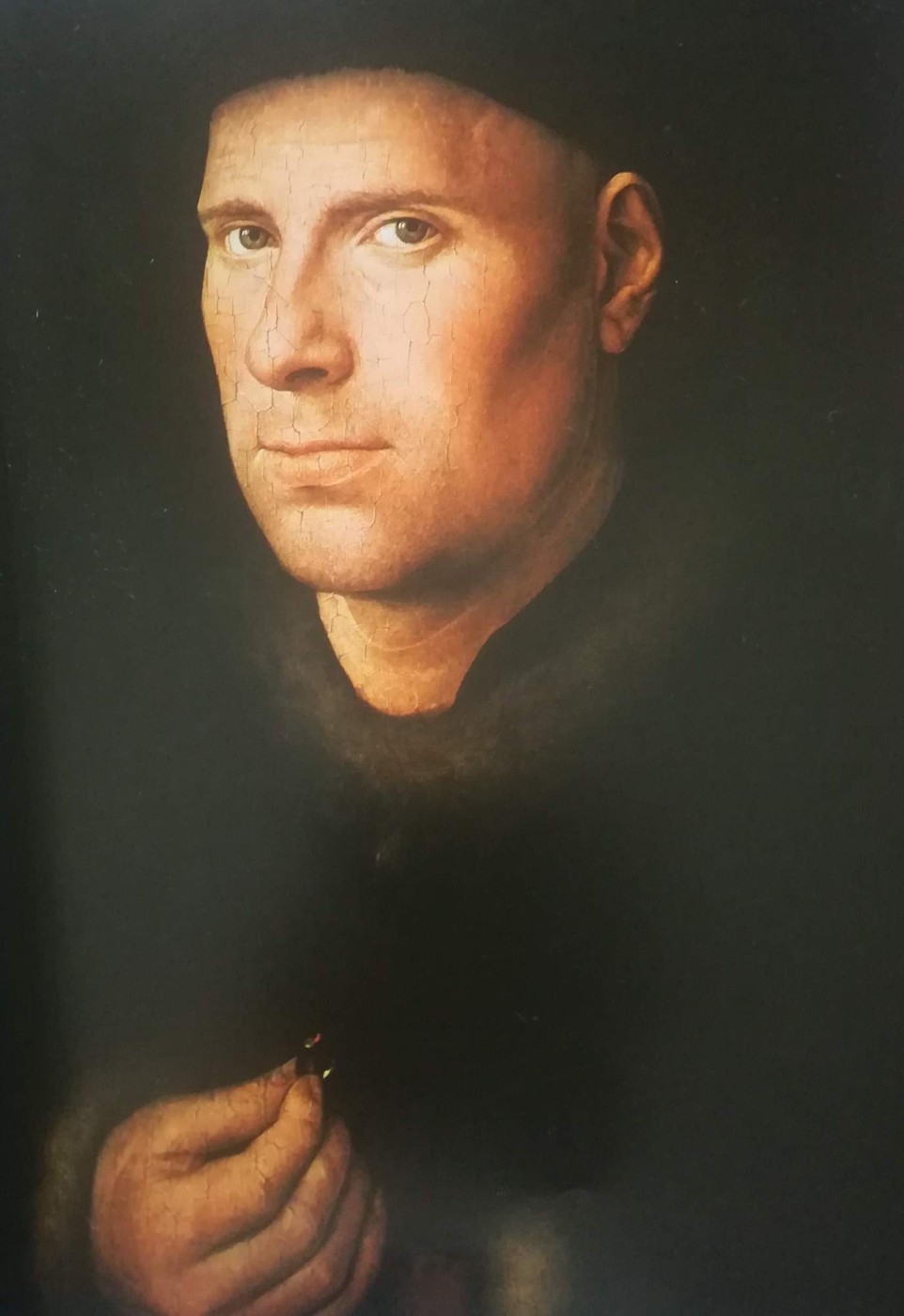orefice di Bruges con un anello in mano - Jan van Eyck