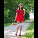 like little red riding hood, she crosses the path alone